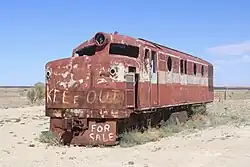NSU56: derelict body shell and bogies at Marree, 2021