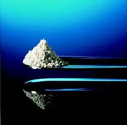 siliceous earth on a spoon