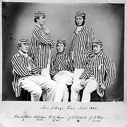Row Boat clubs college student wearing striped shirt