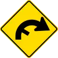 Curve between 90 and 120 degrees with minor road, to right