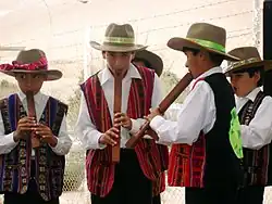 Image 15Bolivian children playing the tarka. (from Culture of Bolivia)