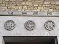 Reliefs above doorway