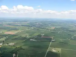 Countryside surrounding North Hampton, with the village in the distance