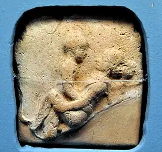 A clay plague of a couple having sexual intercourse in the missionary position, from Old Babylon (2nd millennium B.C.)