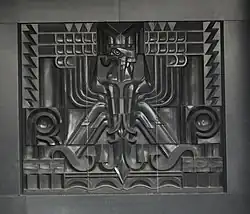Polish coat of arms (unofficial) in Art Deco style, on the façade of the Ministry of Transport in Warsaw (architect Rudolf Świerczyński, 1931)