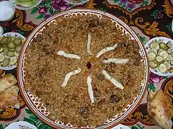 Osh palov, a staple dish in Uzbek, Tajik, and Bukharan Jewish cuisine