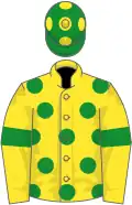 Yellow, green spots and armlets, green cap, yellow spots