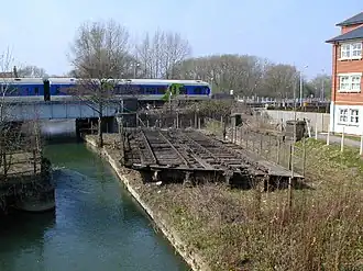 The old swing bridge and the newer railway bridge over the Sheepwash Channel.