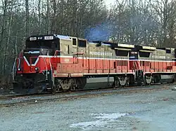 A pair of P&W diesel locomotives on a track. Exhaust can be seen from the lead locomotive, indicating it is on. The locomotives are numbered 4004 and 3907.