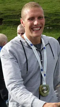 Image 14Pál Joensen after coming back home to his hometown Vágur after winning a silver medal at the 2010 European Aquatics Championships (from Culture of the Faroe Islands)