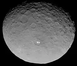 Photo of Ceres taken by the Dawn spacecraft at a distance of 13,600&nbsp;km (8,500&nbsp;mi).