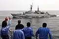 U.S. and Pakistan Navy personnel "Thumbs up" to his shipmates aboard PNS Shah Jahan in the Exercise Inspired Siren in the Indian Ocean in 2002.