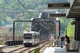 A Blue Line train at First Avenue station, 2015