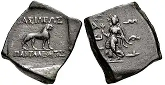 Indian square coin of King Pantaleon with the obverse showing a leopard. The reverse showing a dancing woman (perhaps a Lakshmi). Brahmi legend reads: Rajane Patalevasa ("King Pantaleon").