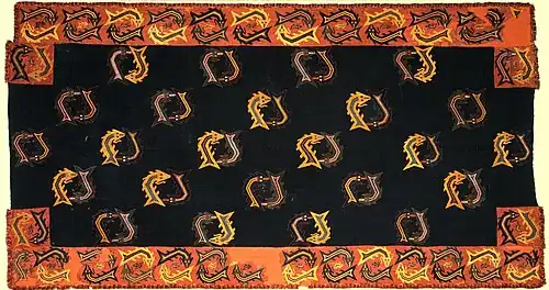 Nazca mantle from Paracas Necropolis, 1-100 CE This is a "double fish" (probably sharks) design, Brooklyn Museum