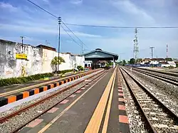 The elevated platform of Pasuruan railway station from the second track, taken in 2023