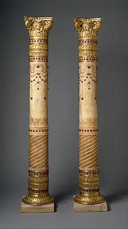 Pair of pedestals that reinterpret the Corinthian order (not just the capital, also the shaft), from the drawing room of the William H. Vanderbilt House, 1879–1882, Egyptian alabaster, gilt brass, and red glass jewels, Metropolitan Museum of Art, New York City