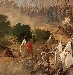 Knight in armor holding the Medrano cross fleury banner