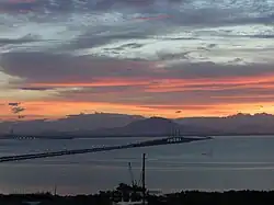 The 13.5 kilometre-long Penang Bridge traverses the South Channel between Gelugor on Penang Island and Perai in the mainland.