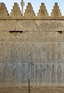 Delegation bearing gifts (Persian Achaemenid); c.490 BC; limestone; c.260 x 150&nbsp;cm; in situ, Persepolis (Iran)[18]