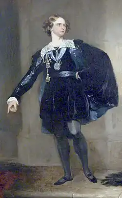 young white man, clean-shaven, with medium length wavy hair, in 16th-century costume