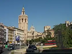 A view of the plaza with buses and streets curving through