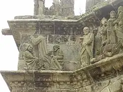 In this view of the north face of the Pleyben calvary we see Jesus praying in the Garden of Olives surrounded by two sleeping apostles. We then see St Peter with his sword looking down to his left at the scene depicting Jesus' arrest.