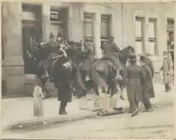 Policemen chase a demonstrator during the strike