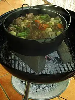 Image 15Potjiekos is a traditional Afrikaner stew made with meat and vegetables and cooked over coals in cast-iron pots. (from Culture of Africa)