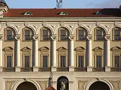 Černín Palace in Prague (1660s) has triglyphs and guttae as ornaments at the top of arches.