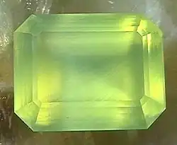 Emerald cut prehnite, 1.85&nbsp;cm × 1.42&nbsp;cm, 4.6 grams.