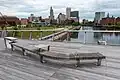 Hardwood benches and chess tables on the bridge