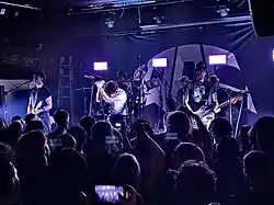 Quarters of Change performing in Dallas in 2024. From left: Ben Acker, Ben Roter, Attila Anrather, and Jasper Harris.