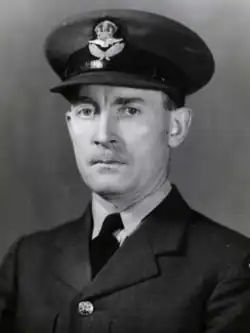 Black-and-white photo of s middle-aged man dressed in a Royal Canadian Air Force uniform