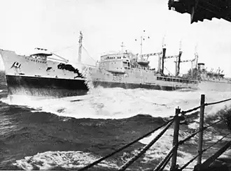 RFA Tidesurge (A98) refuels the US Navy aircraft carrier USS&nbsp;Forrestal on 25 August 1967, in heavy seas between Madagascar and the Cape of Good Hope