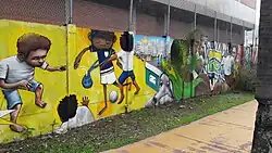 The image refers to the wall of the Artur Alvim Subway Station.