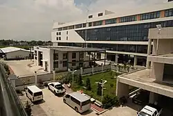 View of the inside of the POGO compound, with multiple parked vehicles