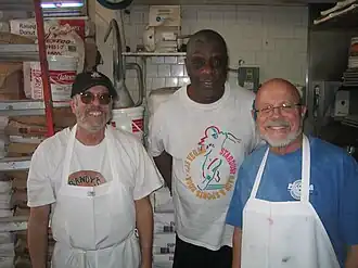 Actor and comedian Jimmie Walker with brothers Ron and Larry Weintraub, 2013
