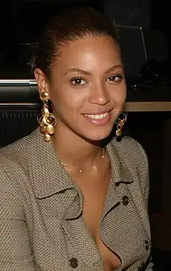 Beyoncé smiling at the camera