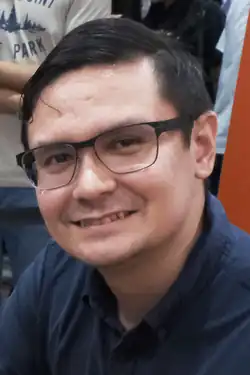 Rangsiman at a book signing in 2023.