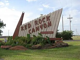 A photo of a sign for Red Rock Canyon Park