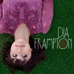 The cover consists of Dia Frampton lying down on a grassfield, wearing a frilly purple dress with winged heart designs. Both the artist's name and album title appear beside her, with the latter inside the 'O', colored in white and red respectively.