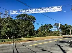 Banner across US 44 notes the 375th anniversary of Rehoboth in 2018