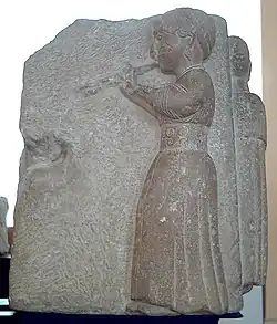 225-175 B.C., Osuna, Greek settlement in Iberian peninsula. Iberian high-relief showing an auletris (woman playing an aulos). It's part of the Sculptures of Osuna.