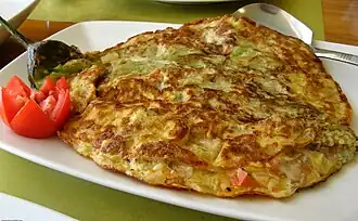 Philippine rellenong talong, an eggplant omelette stuffed with ground meat and vegetables