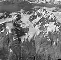 1961 aerial view of Mount Abdallah featuring Romer Glacier