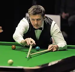 Ryan Day playing a shot