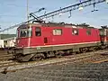 Fully modernized 11267: red color scheme, air conditioning, rectangular headlights, UIC plug, and steps