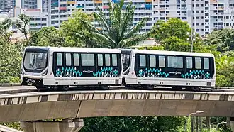 A Bombardier Innovia APM 300R C801B running on the guiderails.