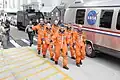 STS-117 crewmembers head for the astrovan